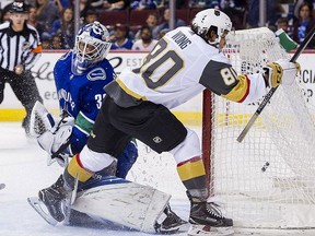 Tyler Wong of the Las Vegas Golden Knights celebrates after scoring a goal against goalie Richard Backman of the Vancouver Canucks in NHL pre-season action on Sept. 17, 2017 at Rogers Arena in Vancouver. (Rich Lam/Getty Images)