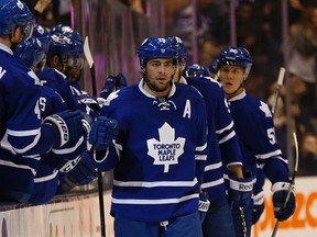 Joffrey Lupul is congratulated after scoring the second goal of the game for the Toronto Maple Leafs vs. Anaheim Ducks on December 16, 2014. (Jack Boland/Toronto Sun)