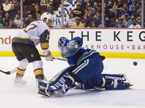 Nick Suzuki #17 of the Las Vegas Golden Knights puts a backhand shot past goalie Thatcher Demko #35 of the Vancouver Canucks in NHL pre-season action on September 17, 2017 at Rogers Arena in Vancouver, British Columbia, Canada. (Photo by Rich Lam/Getty Images)