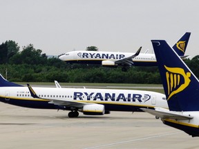 This Tuesday July 21, 2009 file photo, shows Ryanair planes at Stansted Airport in England. Irish budget airline Ryanair is under pressure to provide more information to travelers, on Monday Sept. 18, 2017, after canceling up to 50 flights a day over the next six weeks because it "messed up" its pilots' holiday schedules. (AP Photo/Matt Dunham, File)