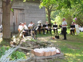 Members of Toronto’s famous Hannaford Street Silver Band prepare to entertain a large audience on the grounds of the Macaulay House Museum in Picton Saturday afternoon.