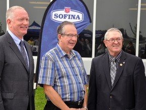 Rick Turvey (left), executive vice-president, operations and supply chain, Sofina Foods Inc., Jeff Leal, Minister of Agriculture, Food and Rural Affairs, and Walter McKenzie, West Perth mayor, were on hand for a funding announcement at Sofina’s Mitchell plant Sept. 18. ANDY BADER/MITCHELL ADVOCATE