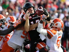 Redblacks quarterback Ryan Lindley tries to control the ball as he attempts a sneak against the Lions. Lindley should get the start against the Bombers on Friday. (The Canadian Press)