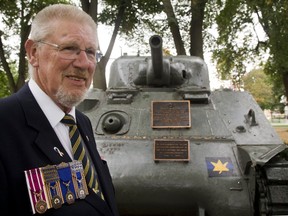 Caspar Koevoets, the new zone commander for the Canadian Legion, stands with the Holy Roller Sherman tank in London?s Victoria Park. Koevoets grew up in a city in the Netherlands liberated by Canadian and British troops. (Mike Hensen/The London Free Press)