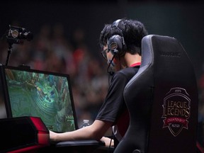 French video game player Hans Sama from the team Misfits Gaming competes in final of the "LCS", the first European divison of the video game "League of Legends", between Misfits Gaming and G2 Esports at the AccorHotels Arena in Paris on September 3, 2017. (AFP PHOTO)