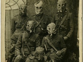 Petrolia's Major Charles Fairbank poses with a group of soldiers wearing gas masks in Steenvoorde, France on Aug. 24, 1916. 
Handout/Sarnia This Week