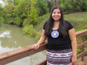 Vanessa Gray, one of the organizers of the Aamjiwnaang Water Gathering and Toxic Tour, stands on a bridge at Bear Park. The gathering is set to begin Sept. 29 and continue through the weekend. Organizers expect approximately 400 people to take part over the course of the weekend. (Paul Morden/Sarnia Observer/Postmedia Network)
