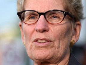Ontario Premier Kathleen Wynne talks to media after appearing as a witness in the Election Act bribery trial in Sudbury on Wednesday, Sept. 13, 2017. (THE CANADIAN PRESS/PHOTO)