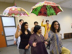 Zeel Joshi, Faiza Imran, and Neelam Sainani rehearse for Live Grand Navaratri Garba 2017, which takes place at 5:30p.m. Saturday at Lucas secondary school. The event will feature music, dancing and authentic food from India. (MORRIS LAMONT, The London Free Press)