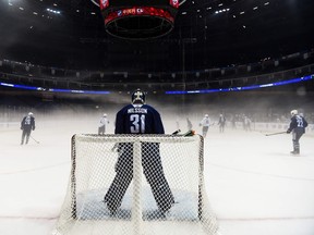 Vancouver Canucks' goaltender Andres Nilsson guards his post during an ice hockey practice session for the 2017 NHL China Games in Shanghai on Sept. 19, 2017. (AFP PHOTO)