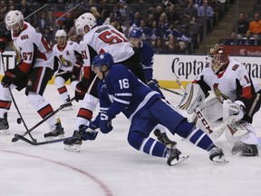 Maple Leafs centre Mitch Marner falls down in front of the Senators net at the Air Canada Centre on Sept. 19. (Veronica Henri/Toronto Sun)