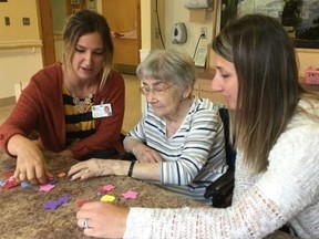 Jennifer Gosselin, left, social worker, Yolande Labbe, resident, and Hilary Grieve, recreation therapist, at St. Joseph’s Health Centre in Sudbury. Supplied photo