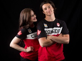 Olympic gold medallists Tessa Virtue, left, and Scott Moir pose for photos during the Canadian team Olympic Summit in Calgary, on Saturday June 3, 2017. (Leah Hennel/Postmedia Network)