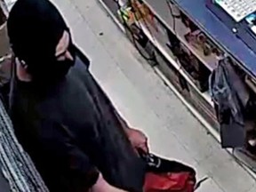 Surveillance footage of a man robbing the Mac's Convenience store at 546 Bath Rd.  in Kingston, Ont. on Wednesday September 20, 2017. Supplied Photo