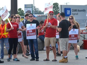 CAMI employees picket outside the delivery entrance at the Ingersoll Automotive Assembly Plant on day one of a strike by workers against GM Canada. (MORRIS LAMONT, The London Free Press)
