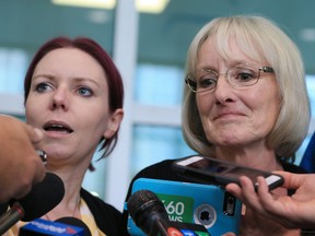 Lisa Mitchell's sister-in-law, Sarah (left), and mom Peggy talk with media outside court on Wednesday, Sept. 21, 2017, after the sentencing of Allan Shyback for manslaughter in Lisa's 2012 death. (GAVIN YOUNG/POSTMEDIA NETWORK)