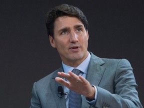 Canadian Prime Minister Justin Trudeau participates in an armchair discussion with Melinda Gates, not shown, in New York, Wednesday, September 20, 2017. (THE CANADIAN PRESS/Adrian Wyld)