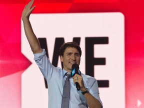 Canadian Prime Minister Justin Trudeau waves to the audience as he appears on stage during WE Day UN in New York City, Wednesday September 20, 2017. (THE CANADIAN PRESS/Adrian Wyld)