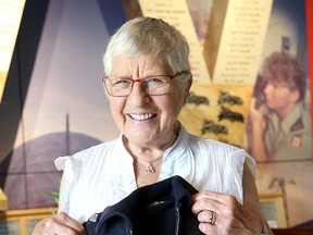 Liesbeth (Kalff) Langford, who as a young girl was given breakfast by troops trained at CFB Kingston during the Liberation of Holland in 1945, is donating a jacket with the badge of the Communications and Electronic branch to the Military Communications & Electronics Museum on the base. (Ian MacAlpine /The Whig-Standard)