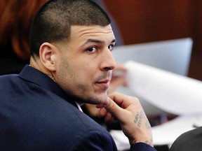 In this March 15, 2017, file photo, Aaron Hernandez listens during his double murder trial in Suffolk Superior Court, in Boston. (AP Photo/Elise Amendola, Pool, File)