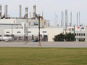 The GM CAMI assembly factory parking lot sits empty as employees walk the picket line in Ingersoll, Ont., on Monday, Sept. 18, 2017.  THE CANADIAN PRESS/Dave Chidley