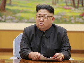 In this Sept. 3, 2017, image distributed on Sept. 4, 2017, by the North Korean government, North Korea's leader Kim Jong Un holds a meeting of the ruling party's presidium. Kim is calling President Donald Trump "deranged" and says in a statement carried by the state news agency that he will "pay dearly" for his threats. The statement, carried by North's official Korean Central News Agency, responds to Trump's combative speech at the U.N. General Assembly on Tuesday, Sept. 19. (Korean Central News Agency/Korea News Service via AP, File)