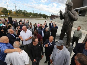 A bronze statue of former Winnipeg Blue Bomber coach and general manager Cal Murphy was unveiled outside Investors Group Field in Winnipeg following a ceremony on Thurs., Sept. 21, 2017. Kevin King/Winnipeg Sun/Postmedia Network