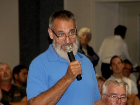 Water Wells First spokesman Kevin Jakubec speaks during a question-and-answer session on the North Kent Wind project held at Immaculate Conception Church hall in Pain Court  on Thursday night. (Trevor Terfloth/The Daily News)