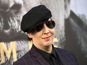 Marilyn Manson attends the world premiere of 'Arthur: Legend of the Sword' at the TCL Chinese Theatre on May 8, 2017 in Hollywood, California. / AFP PHOTO / VALERIE MACON (Photo credit should read VALERIE MACON/AFP/Getty Images)