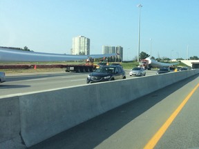 Trucks carrying massive wind turbine blades making their way through rush hour traffic in Ottawa Wednesday.