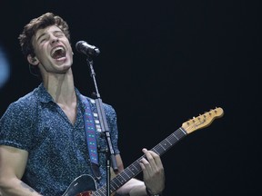 In this Sept. 16, 2017, file photo, Canadian singer Shawn Mendes performs at the Rock in Rio music festival in Rio de Janeiro, Brazil. Mendes announced on Sept. 22, 2017, that he was launching an online fundraiser to help those affected by the Sept. 19 earthquake in Mexico. (AP Photo/Leo Correa, File)
