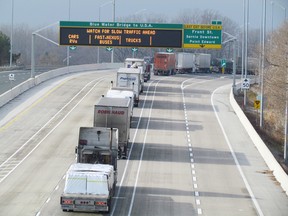 A pilot project at the Blue Water Bridge is aimed at allowing local traffic to reach the toll booths on Highway 402 without having to cross several lanes of traffic.The pilot project is expected to run through the end of the year. (File photo)