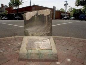 This photo taken May 5, 2005, shows the historic pre-civil war auction block for slaves and property at the corner of Charles and William Streets in downtown Fredericksburg, Va. (Reza A Marvashti /The Free Lance-Star via AP)