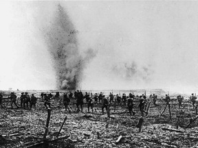 (WW1 -1914-1918) Canadians advancing through German wire entanglements-Battle of Vimy Ridge,April 1917/The Public Archives of Canada