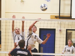 Jaxon Slocomb and Will Smith played for County Central High School’s Team A during a volleyball touranment that County Central hosted Friday and Saturday.
