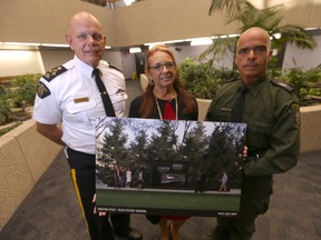 From the left - RCMP Assistant Commissioner Scott Kolody, MGEU President Michelle Gawronsky, and Robert Belanger, President of the Peace Officers Memorial Foundation. at a news conference regarding the fundraising effort to build a Peace Officer Memorial Statue, in Winnipeg. Friday, September 22, 2017. Chris Procaylo/Winnipeg Sun/Postmedia Network