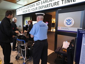 The entrance to U.S. customs at the Calgary International Airport  is seen in a file photo. (STUART DRYDEN/Postmedia Network File Photo)