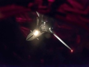 In this image provided by the U.S. Air Force, a U.S. Air Force B-1B Lancer, assigned to the 37th Expeditionary Bomb Squadron, deployed from Ellsworth Air Force Base, South Dakota, receives fuel from a U.S. Air Force KC-135 Stratotanker on Saturday, Sept. 23, 2017. (Tech. Sgt. Richard P. Ebensberger/U.S. Air Force via AP)