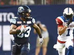 Argonauts defender Alden Darby returns an interception during Saturday night’s decisive victory over Montreal. The Canadian Press