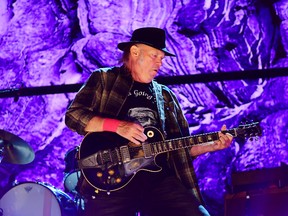 Neil Young performs during 2017 Farm Aid on September 16, 2017 in Burgettstown, Pennsylvania. (Photo by Matt Kincaid/Getty Images)