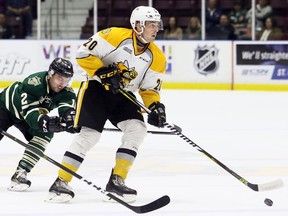 Connor Schlichting (20) of the Sarnia Sting plays against the London Knights in an OHL exhibition game at Progressive Auto Sales Arena in Sarnia, Ont., on Saturday, Sept. 2, 2017. (Mark Malone/Postmedia Network)