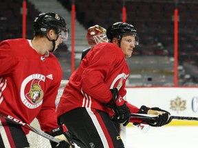Dion Phaneuf (R) and Thomas Chabot of the Ottawa Senators during the morning skate at Canadian Tire Centre in Ottawa, September 22, 2017. (Photo by Jean Levac)