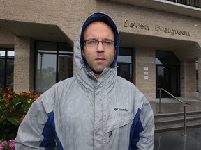 Carl O'Brien is pictured outside his apartment block at 7 Evergreen Place in the Osborne Village area of Winnipeg on Sun., Sept. 24, 2017. O'Brien is upset that tenants on floors two through seven were given notice Friday to vacate the building due to damage from a fire on Sept. 2. Kevin King/Winnipeg Sun/Postmedia Network
