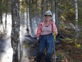 Maine forest rangers say Nancy Weeks used a frying pan to carry water back and forth between the flames and a nearby pond in a wooded area near Beddington, Maine. (Maine Forest Rangers/Facebook)