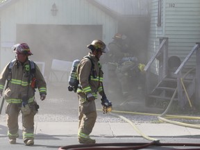 Kingston Fire and Rescue respond to a house fire on Concession Street Monday, Sept. 25. Elliot Ferguson/The Whig-Standard