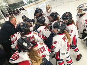 Members of the atom A Belleville Bearcats listen to instructions from the bench at last weekend's girls rep hockey tournament in Oshawa. (Submitted photo)