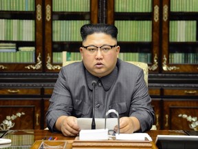 This picture taken on September 21, 2017 and released from North Korea's official Korean Central News Agency (KCNA) on September 22 shows North Korean leader Kim Jong-Un delivering a statement in Pyongyan as regards to a speech made by the president of the United States of America at the UN General Assembly. US President Donald Trump is "mentally deranged" and will "pay dearly" for his threat to destroy North Korea, Kim Jong-Un said, in an unprecedented personal attack published hours after Washington vowed tougher sanctions over Pyongyang's nuclear programme. / AFP PHOTO