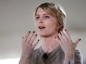 Chelsea Manning addresses an audience, Sunday, Sept. 17, 2017, during a forum in Nantucket, Mass. Manning, the former U.S. soldier who leaked thousands of classified military documents, says she's been barred from entering Canada as a result of her criminal record. THE CANADIAN PRESS/AP/Steven Senne