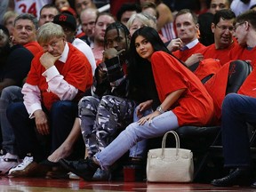 Houston rapper Travis Scott and Kylie Jenner watch courtside during Game Five of the Western Conference Quarterfinals game of the 2017 NBA Playoffs at Toyota Center on April 25, 2017 in Houston, Texas. NOTE TO USER: User expressly acknowledges and agrees that, by downloading and/or using this photograph, user is consenting to the terms and conditions of the Getty Images License Agreement. (Photo by Bob Levey/Getty Images)
