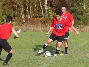 Members of the Laurentian Voyageurs soccer team run through a drill during team practice in Sudbury, Ont. on Monday September 25, 2017. Laurentian hosts Carleton on Sunday afternoon, the women play a 12:00 and the men at 2:15 at the Laurentian Soccer Field. Gino Donato/Sudbury Star/Postmedia Network